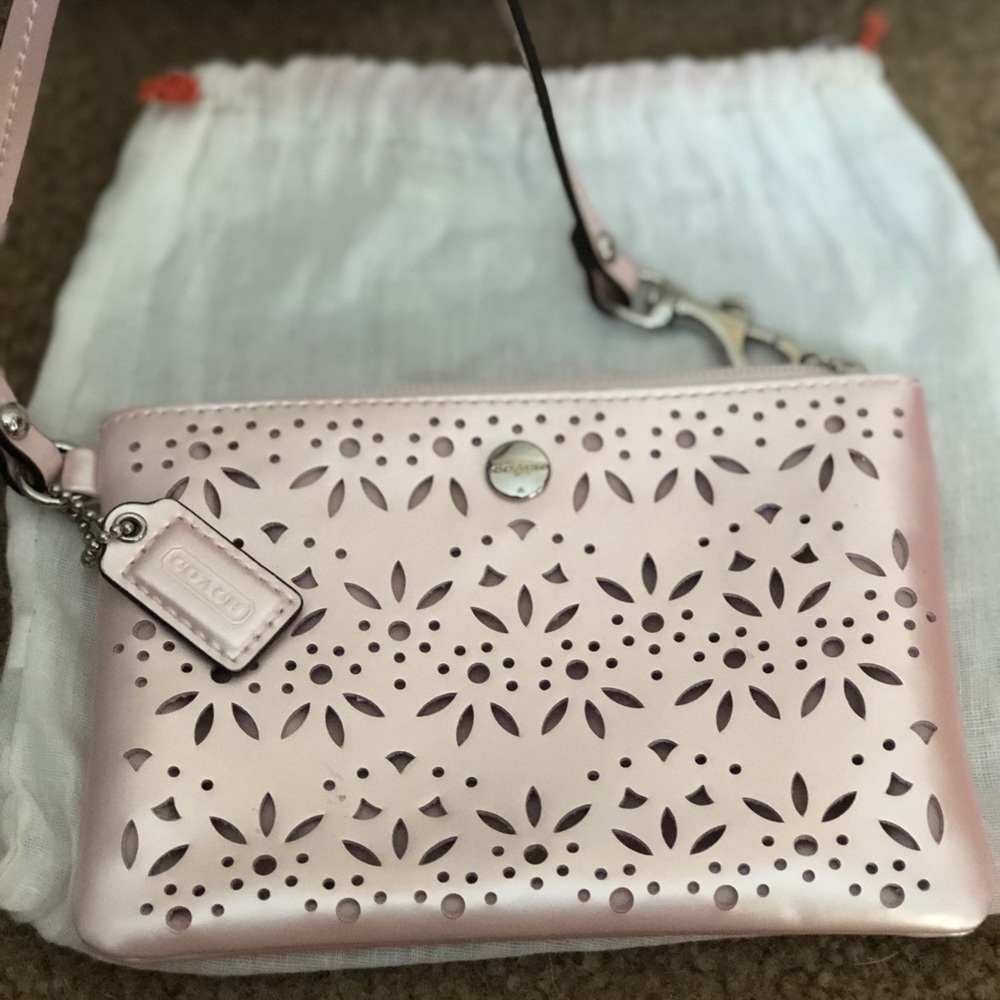 Shimmery pink Coach wristlet